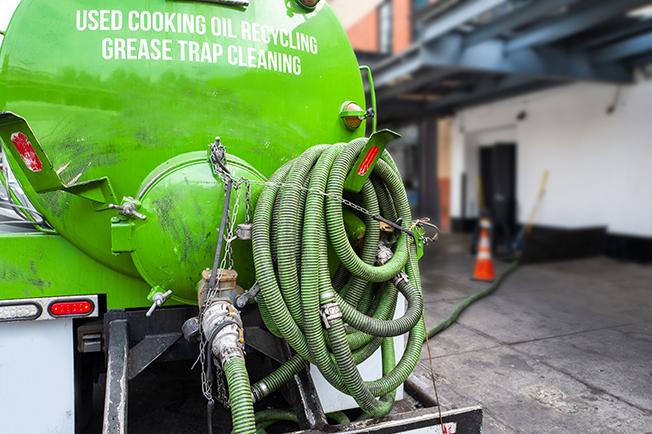 workers at Grease Trap Cleaning of Roslindale